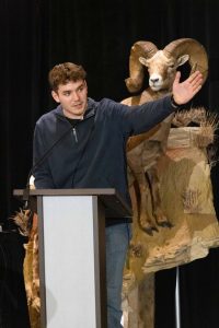 Jonathan Phenix accepting a conservation scholarship
